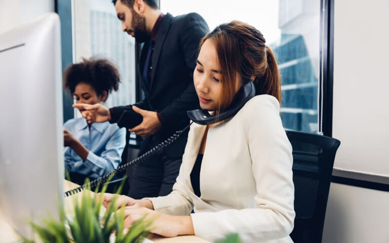 woman on the phone with client support