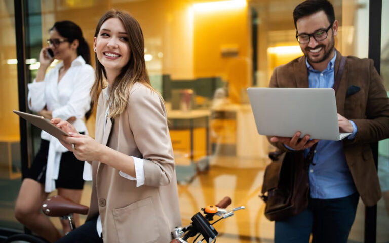 woman smiling while working outdoors