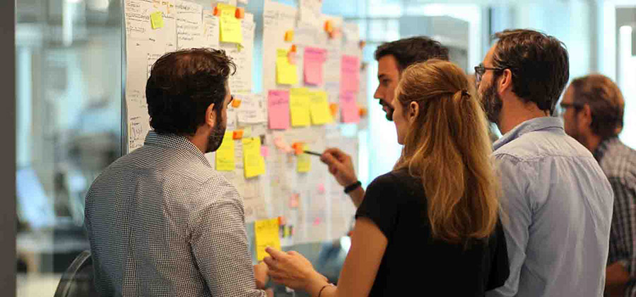 team working on board at the office