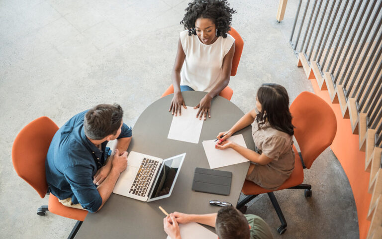 diverse team working on a quick meeting
