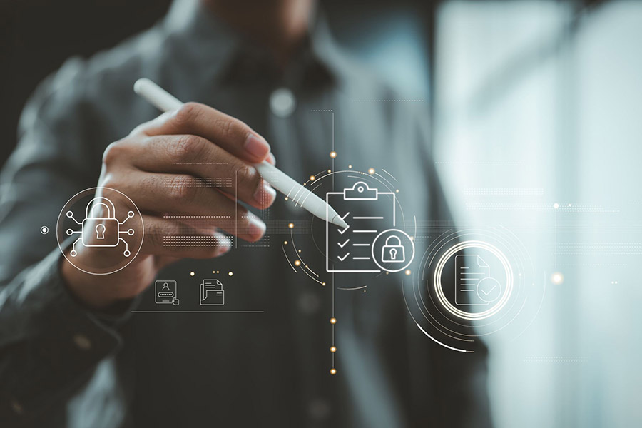 man with pen and security graphics