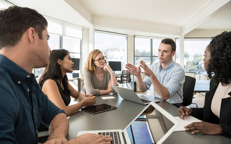 expert agent talking with team during meeting