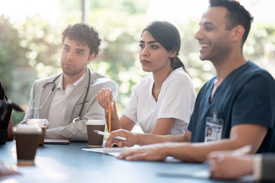 nurse and medical team during meeting