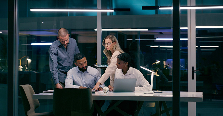 team at the office working late