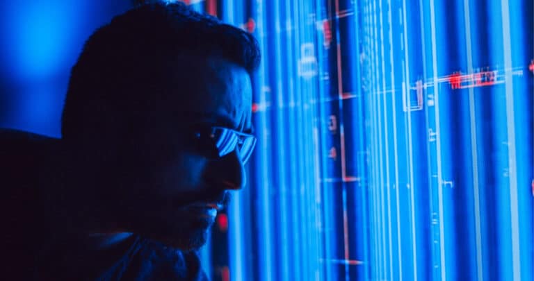 man working at the office with blue screen data