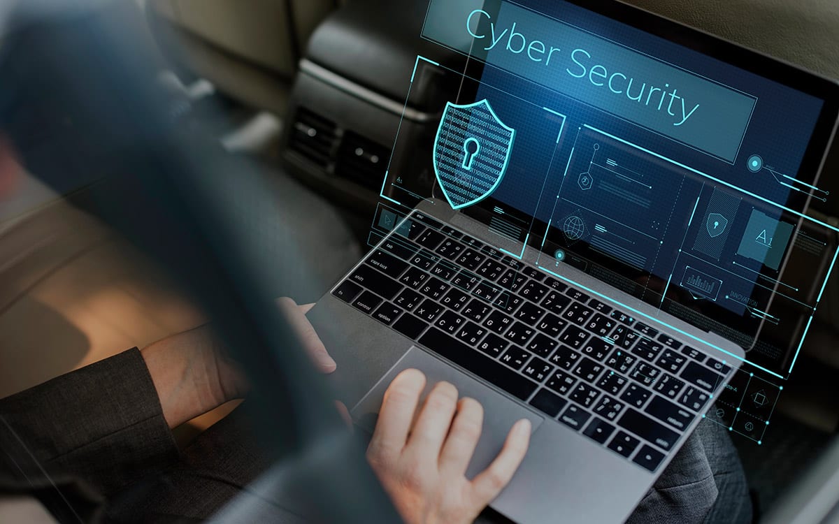 businessman working on his laptop on cybersecurity