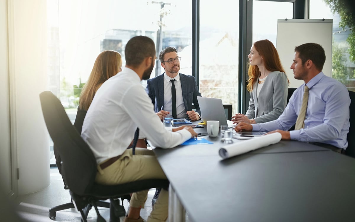 lawyer with clients talking about a project